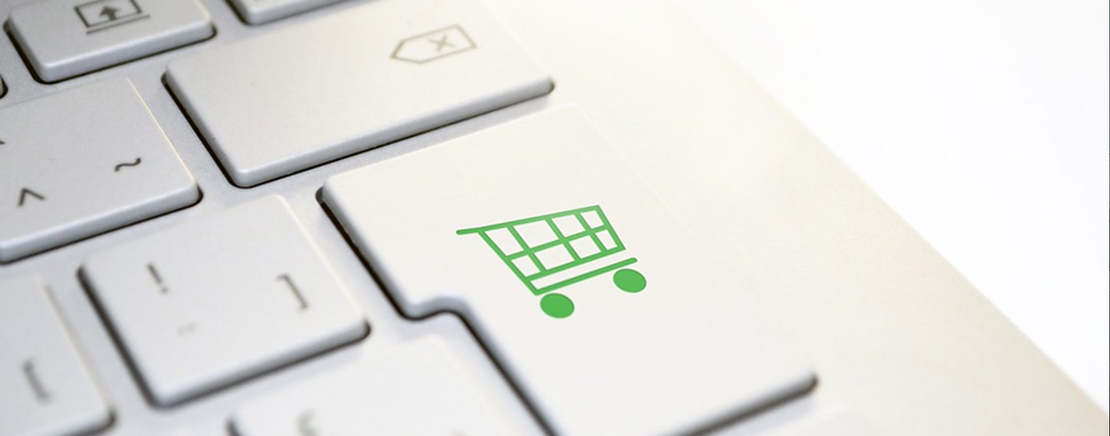 Laptop computer keyboard with ecommerce shopping cart key