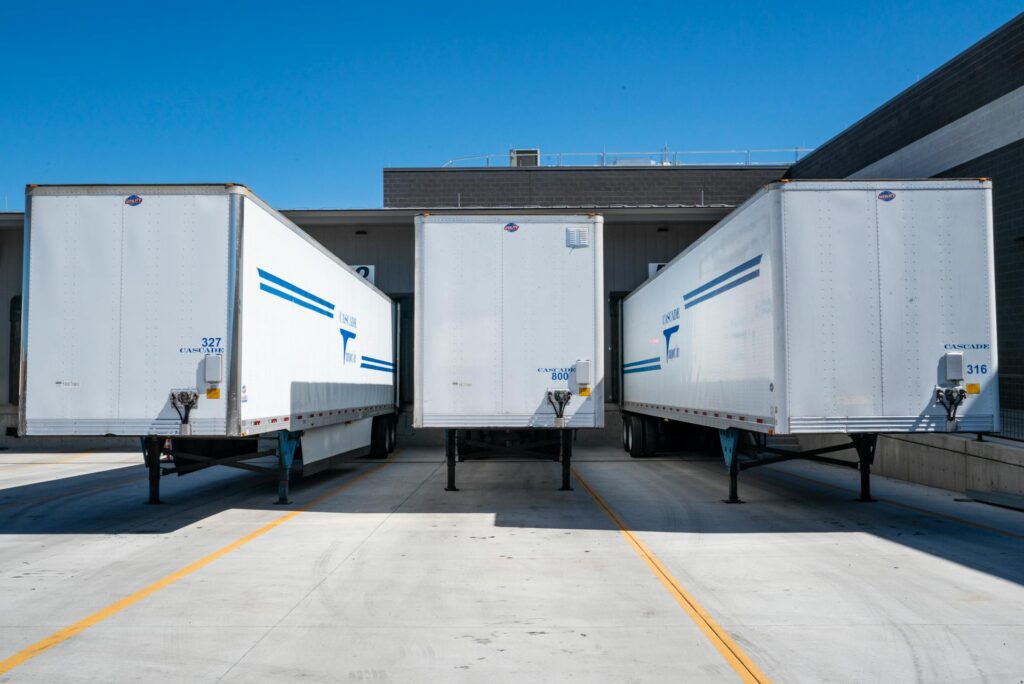 Three truck trailers supporting logistics